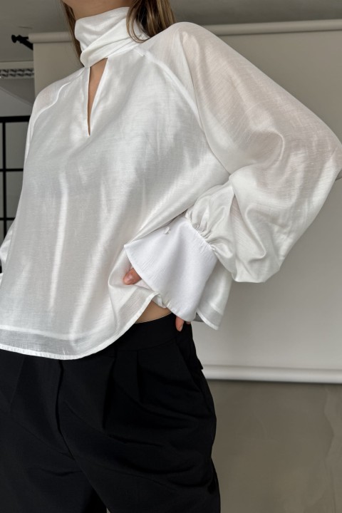 biala koszula z bufiastym rekawem